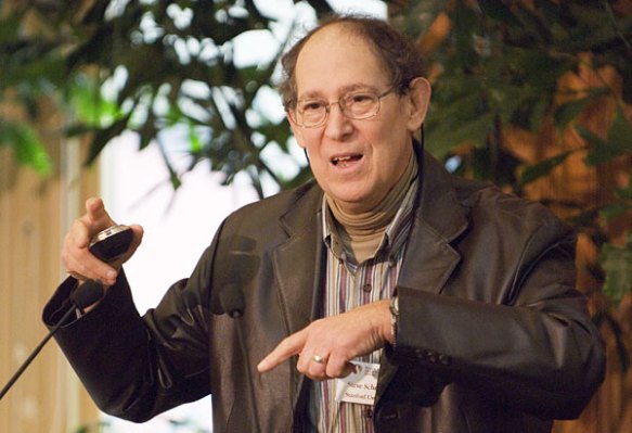 Dr Schneider explaining something.